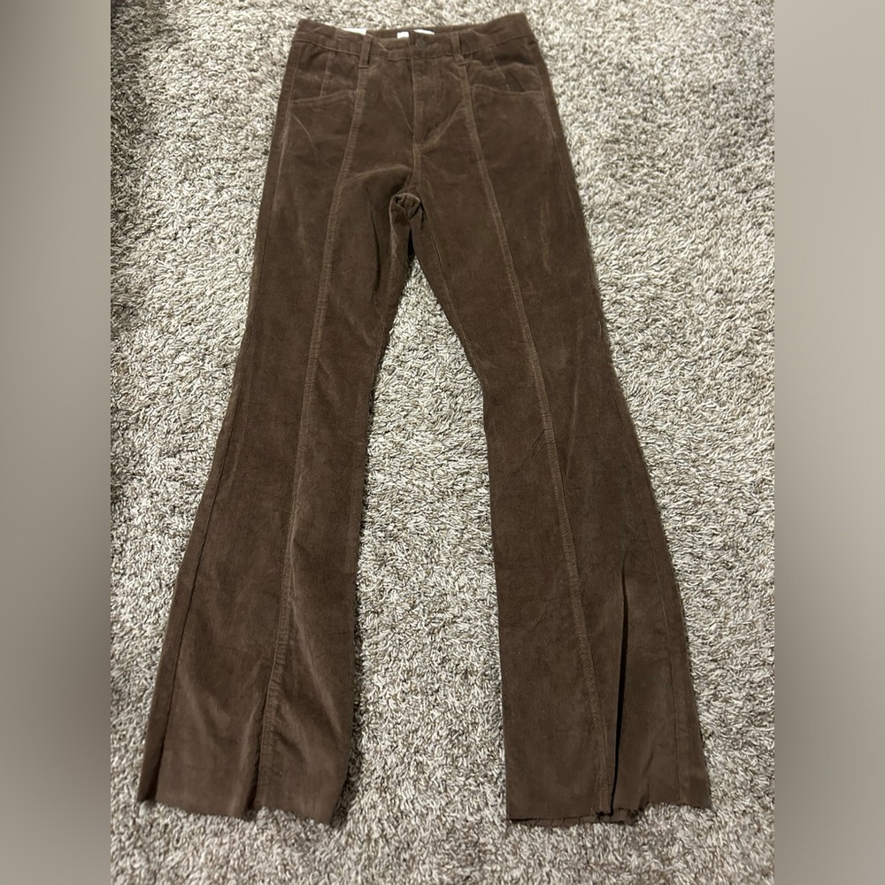 Brown flare jeans.